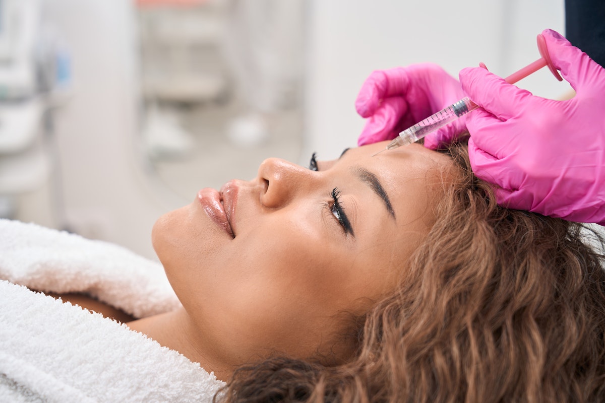 woman getting an injectable treatment